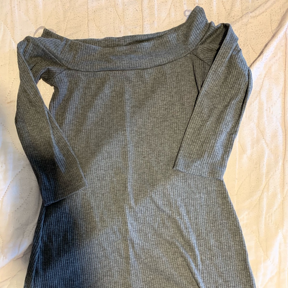 A nice dress. Shows off your body shape.